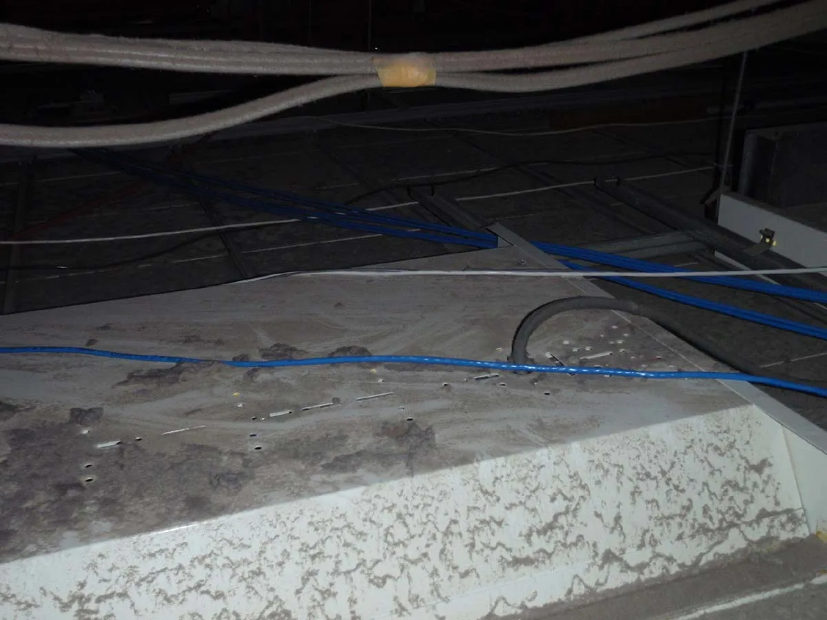 Ceiling void before professional HEPA cleaning