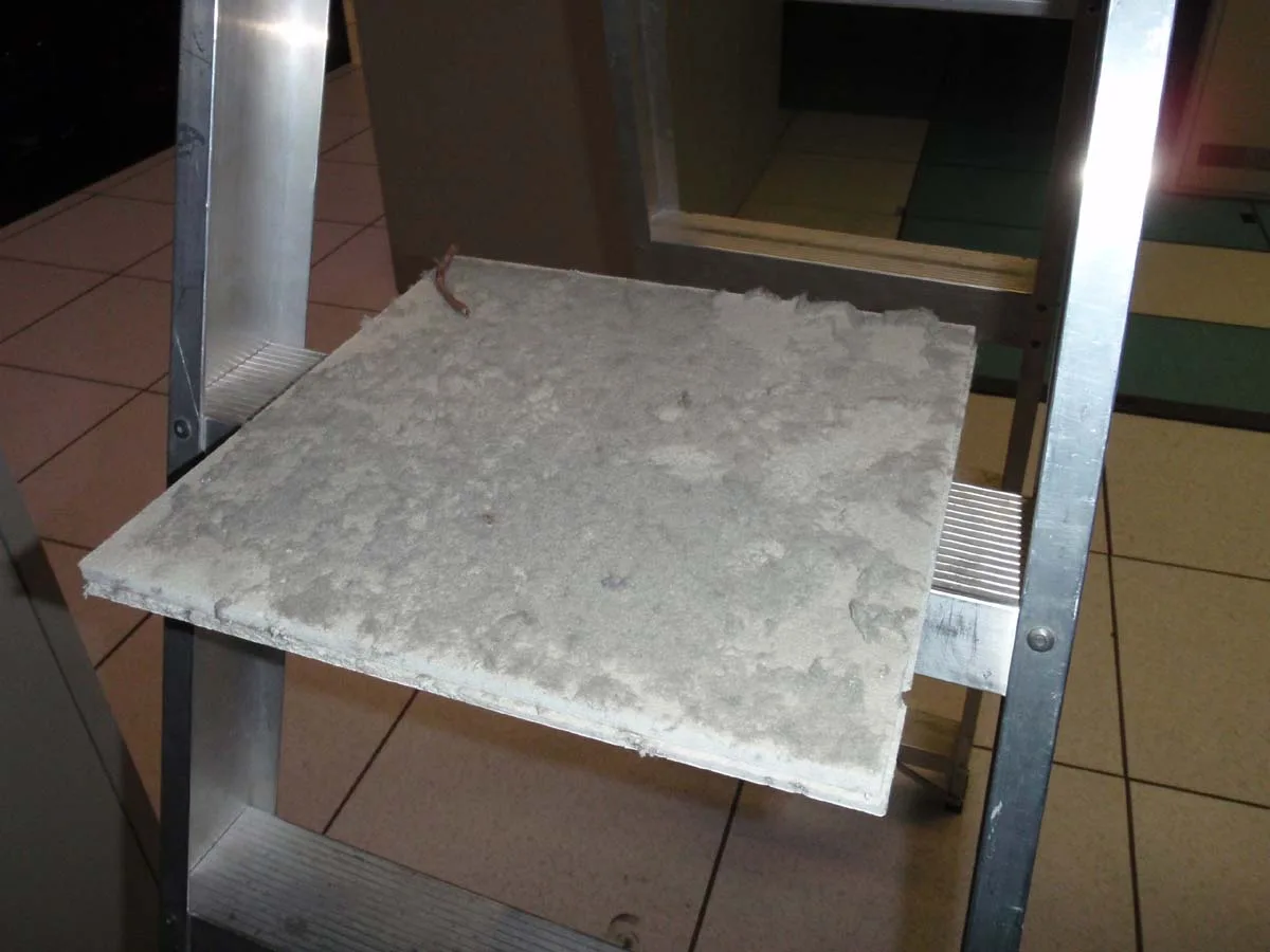 Close-up of particulate contamination on ceiling void surfaces