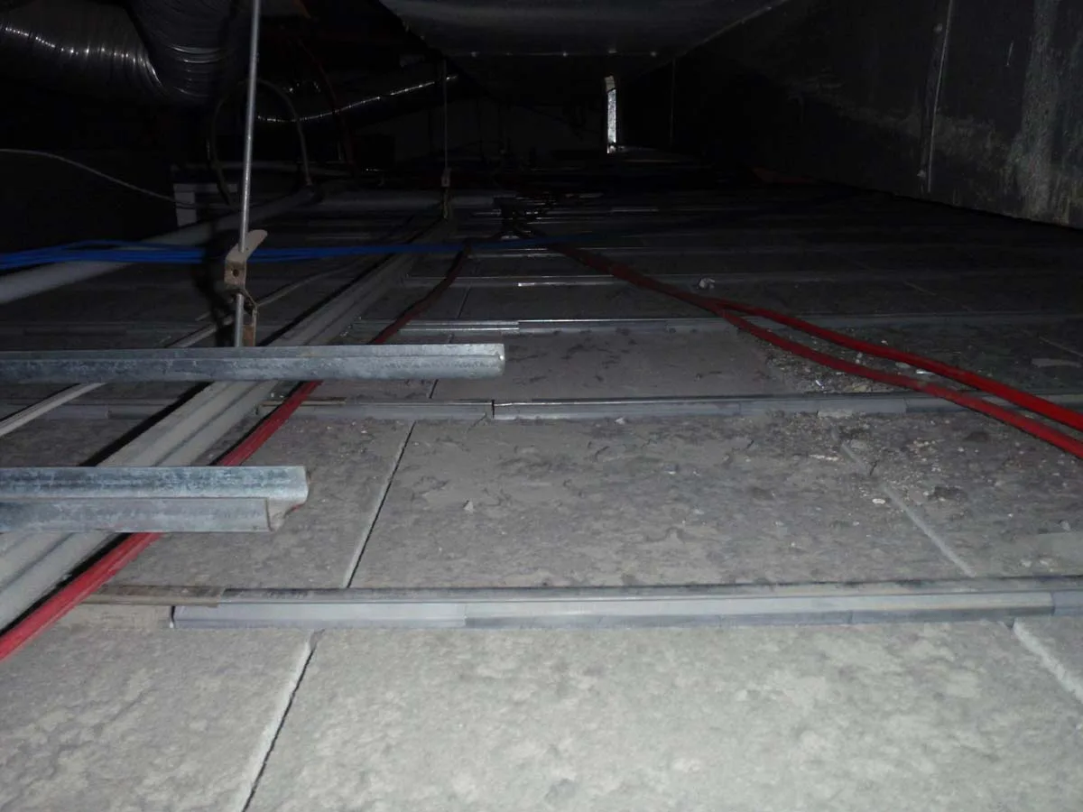 Construction debris and dust in data centre ceiling void