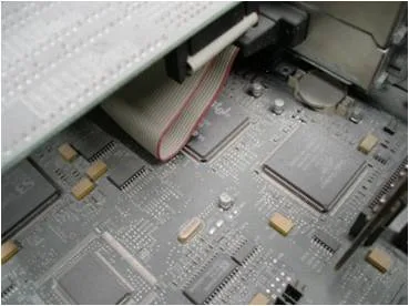 Heavily contaminated motherboard before cleaning by Priority Data Services