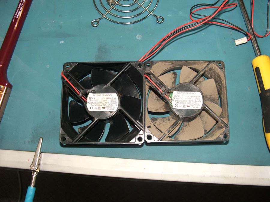 Server fans contaminated with heavy dust accumulation