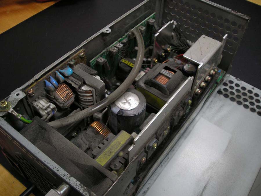 Heavily contaminated power supply before cleaning by Priority Data Services