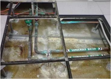 Subfloor plenum showing metal corrosion found during data centre audit